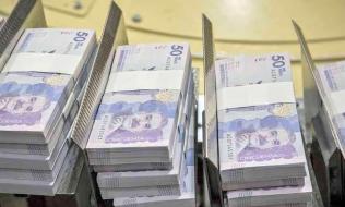 Imagen de dinero que representa una caída de $4,9 billones en el recaudo del SGR